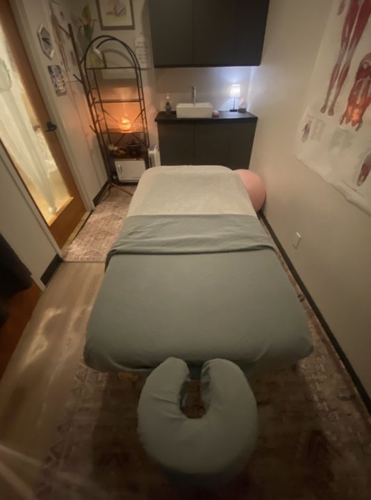 The treatment room, table made up and lamps lit